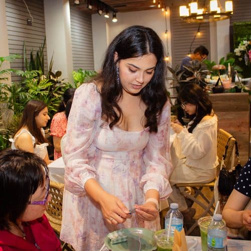 Jasmine at a Get OffBeat workshop table
